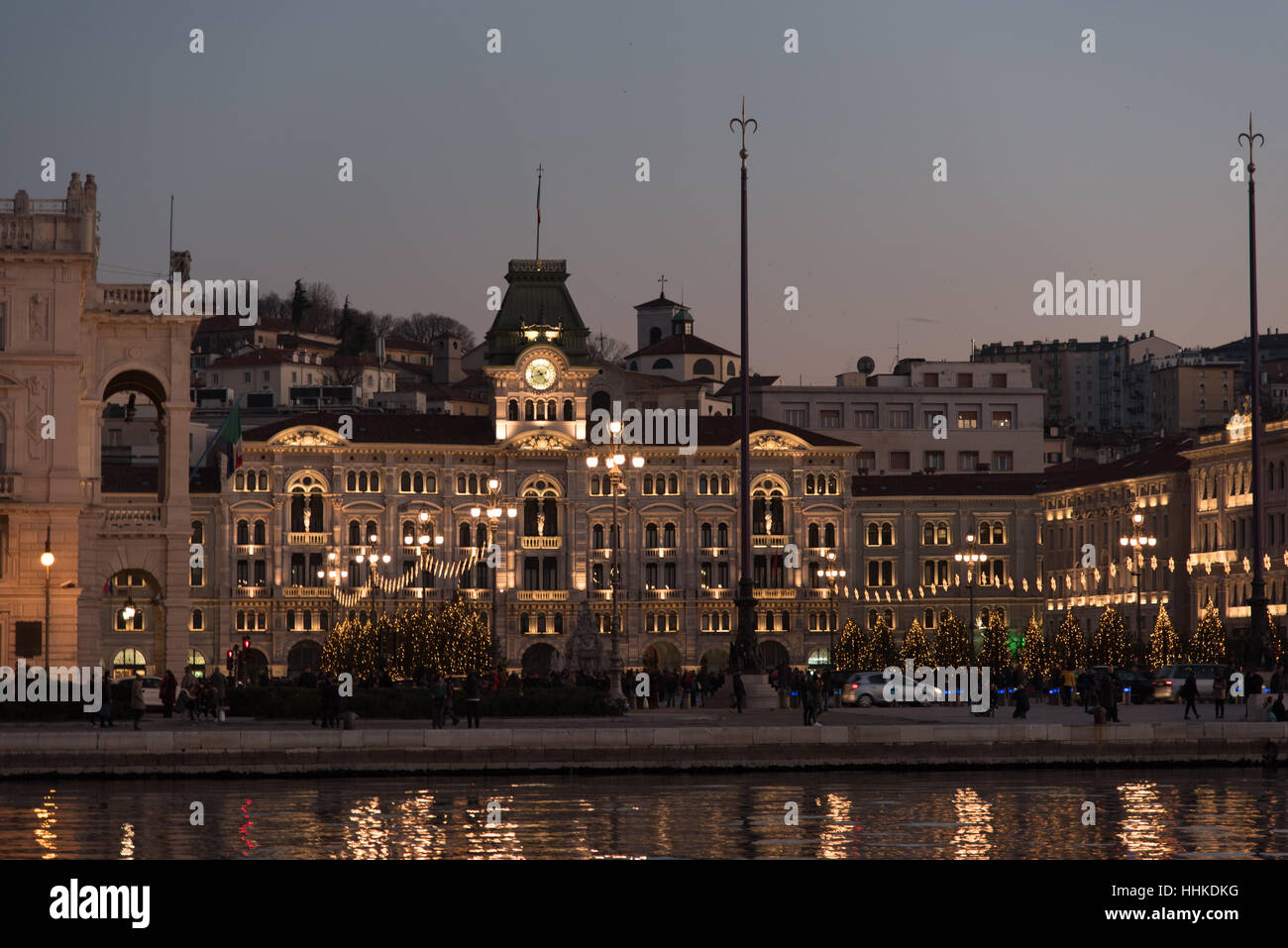 Trieste Night Night walk at dusk between the buildings of Trieste and the sea Stock ...