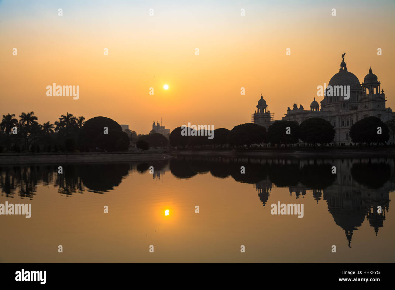 Silhouette sunrise view of Victoria Memorial architectural building monument and museum at Kolkata, India. Stock Photo