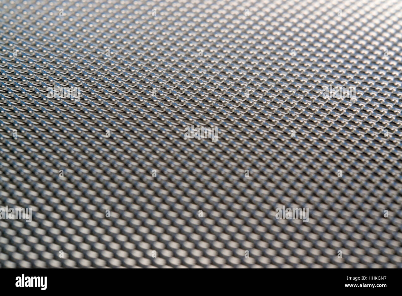 abstract background showing a fine metallic meshwork Stock Photo