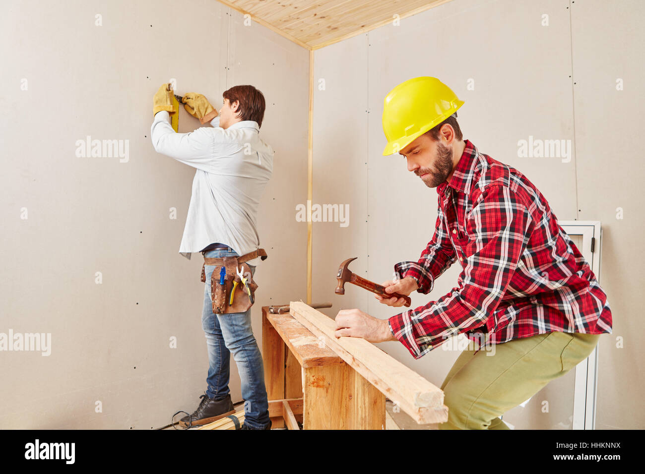 House renovation with craftsman and artisan working Stock Photo