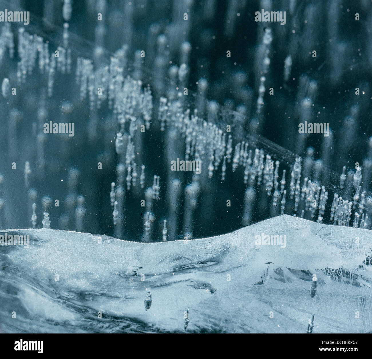 Beautiful pure ice with cracks on the Lake Baikal. Unique, wonderful ...