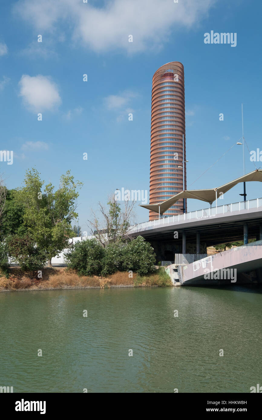 The Sevilla Tower (Torre Sevilla) from a boat the Guadalquivir river,Seville, Stock Photo