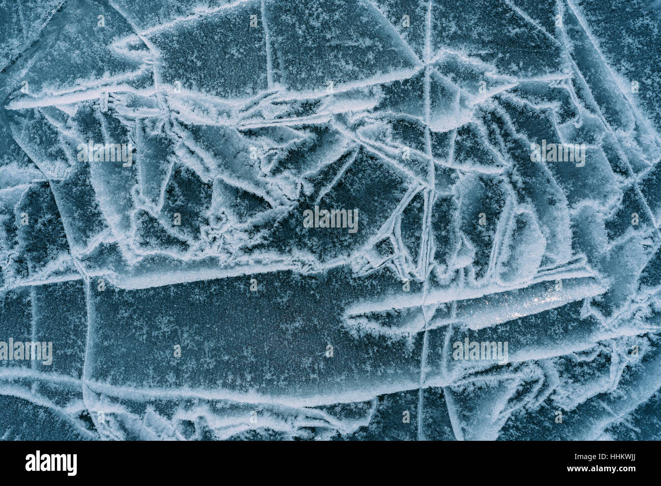 Beautiful pure ice with cracks on the Lake Baikal. Unique, wonderful ...