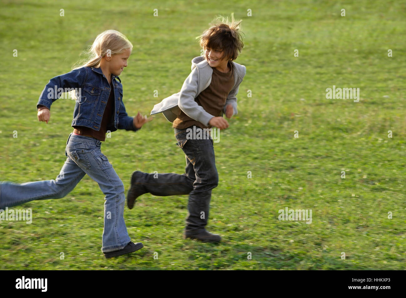 boy and girl running Stock Photo Alamy