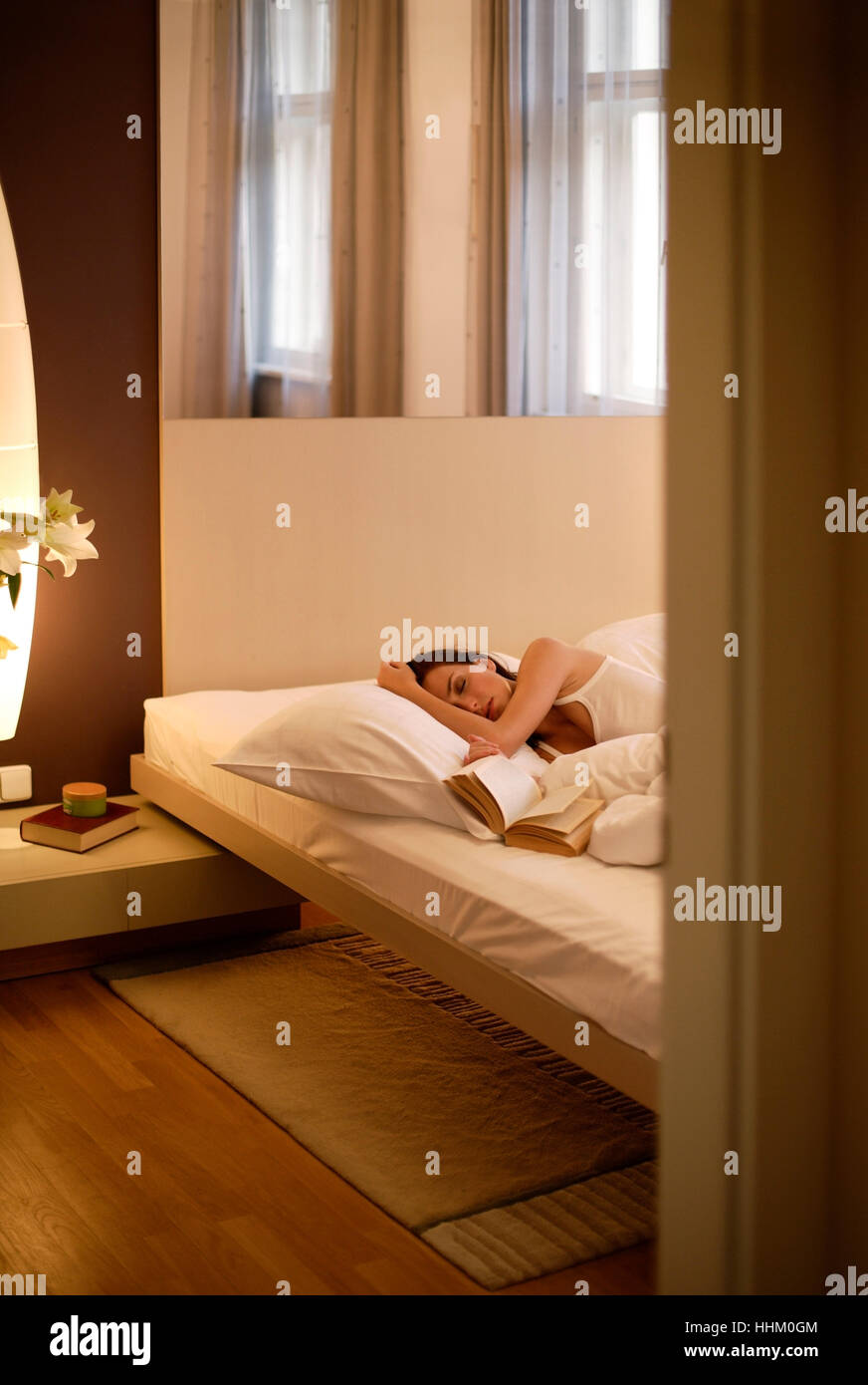 Young woman sleeping Stock Photo - Alamy