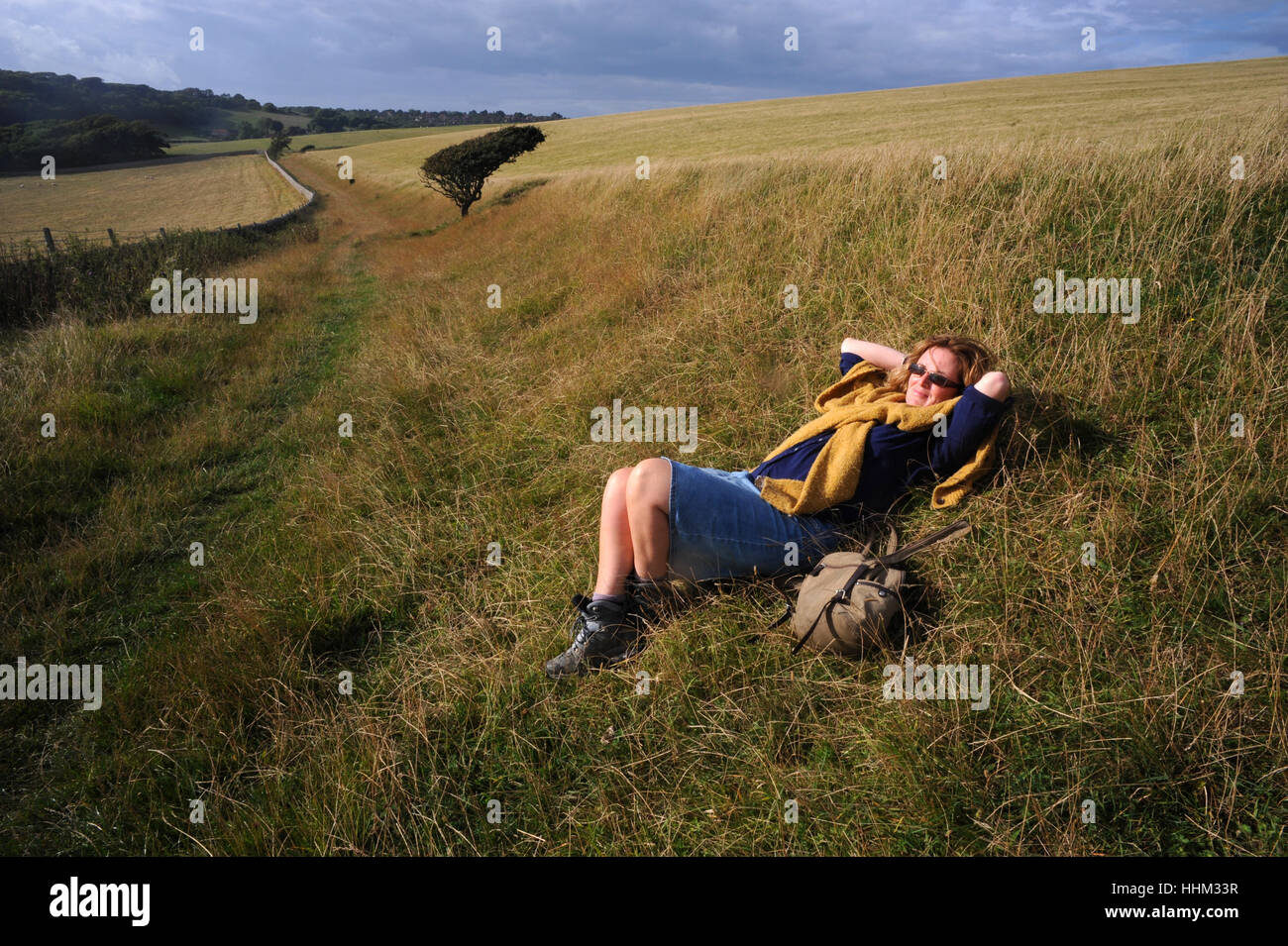 Soaking up the sun during a country walk Stock Photo