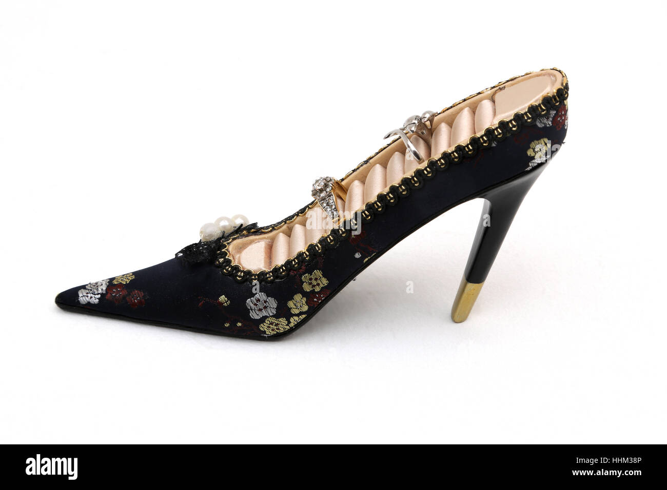 Stiletto Heel Shoe Ring Holder And Rings Stock Photo Alamy