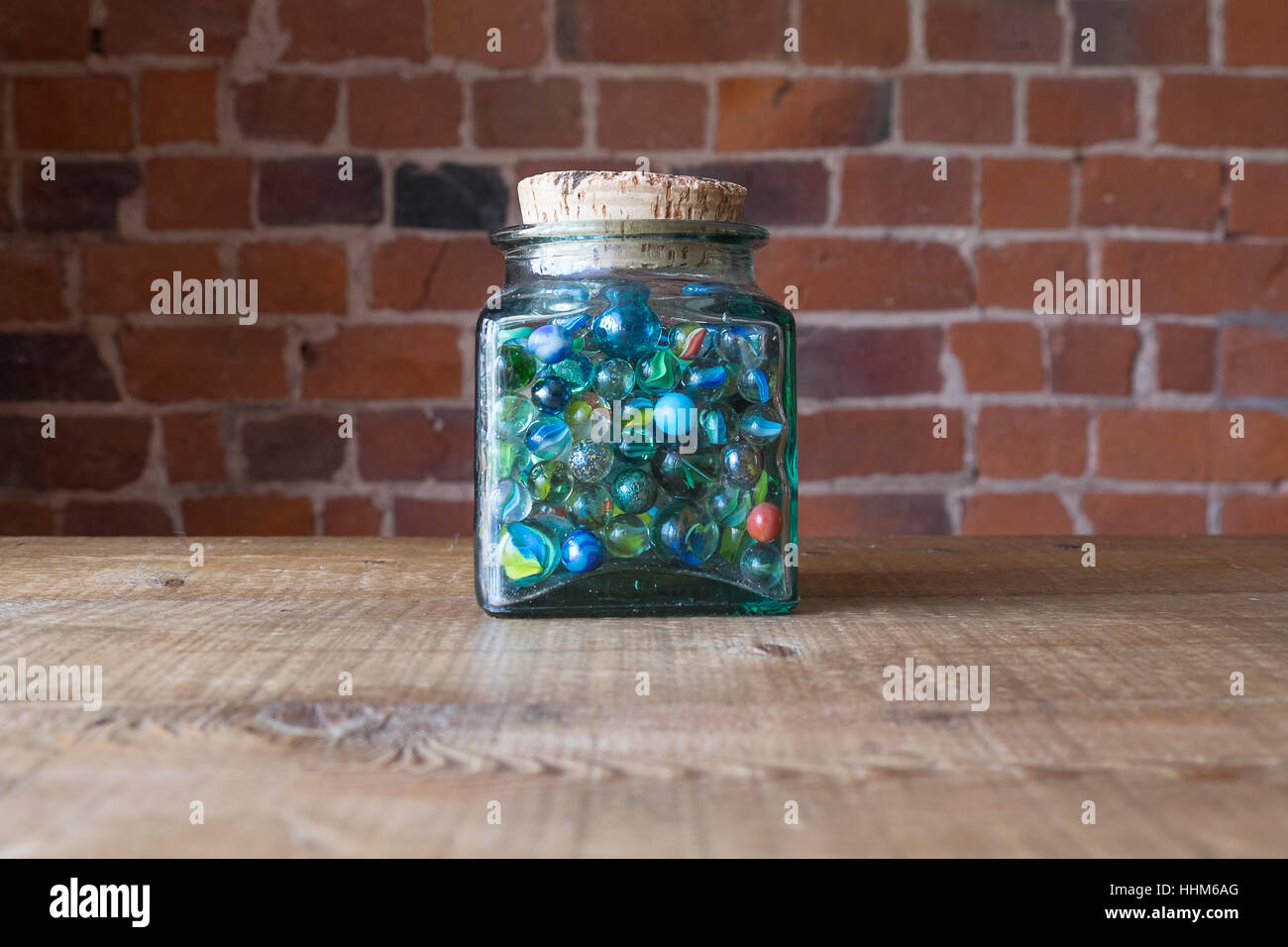 Marbles in a jar Stock Photo Alamy
