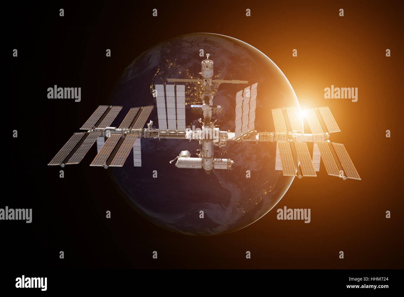 International Space Station over the planet Earth. Elements of this image furnished by NASA. Stock Photo