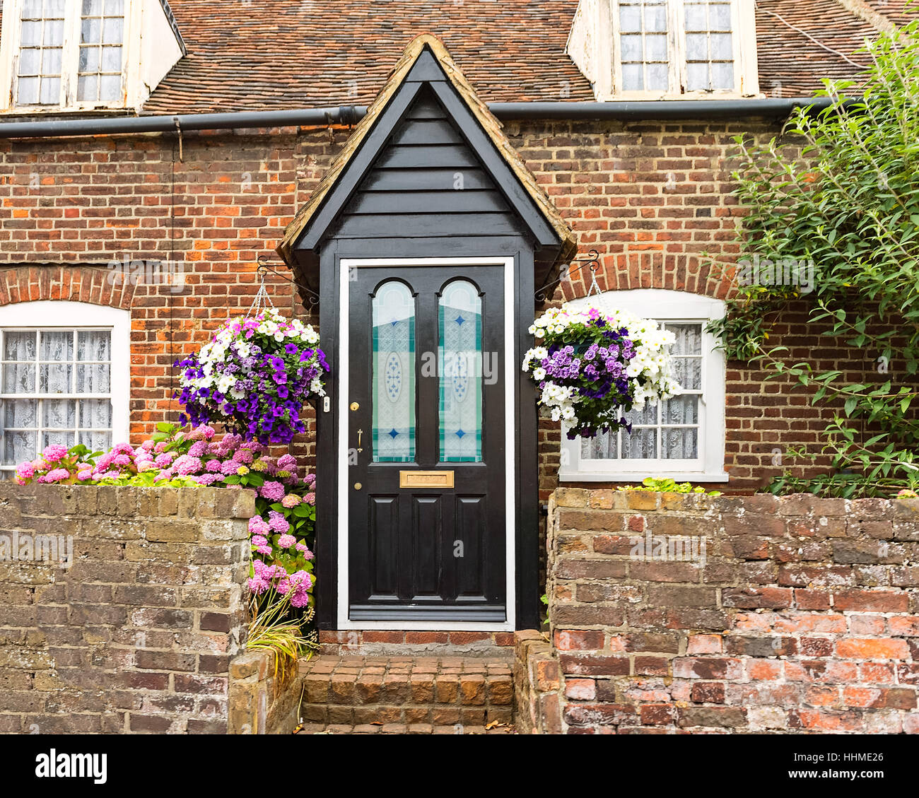 Door flowers steps entrance hi-res stock photography and images - Alamy