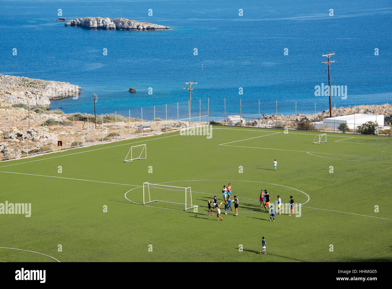 School football pitches overlooking Lindos Bay in Rhodes, Greek Islands Stock Photo