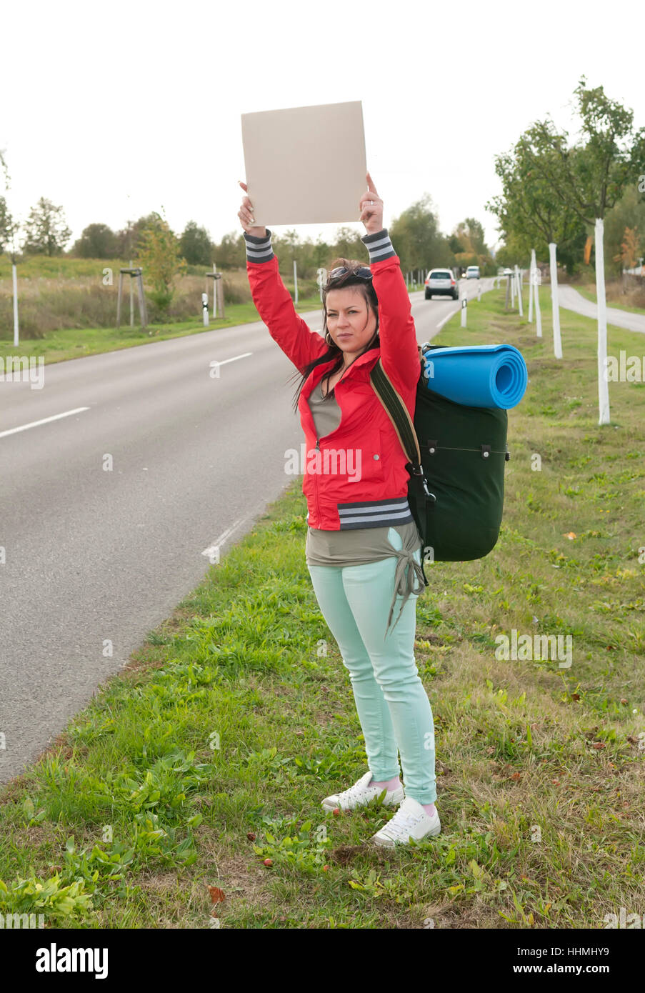 hitchhiker with sign Stock Photo Alamy