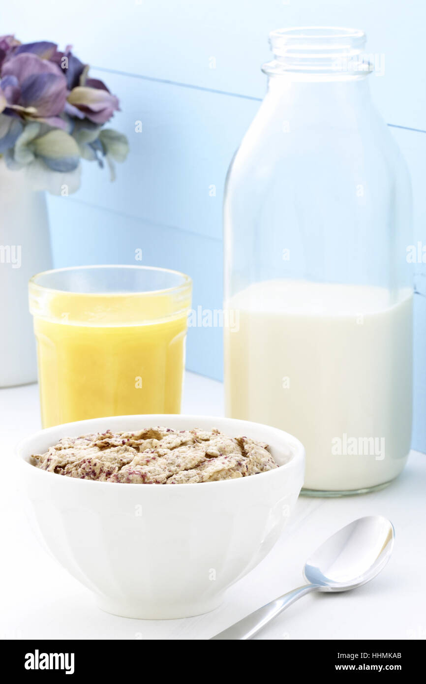 Delicious and healthy breakfast cereal with orange juice Stock Photo