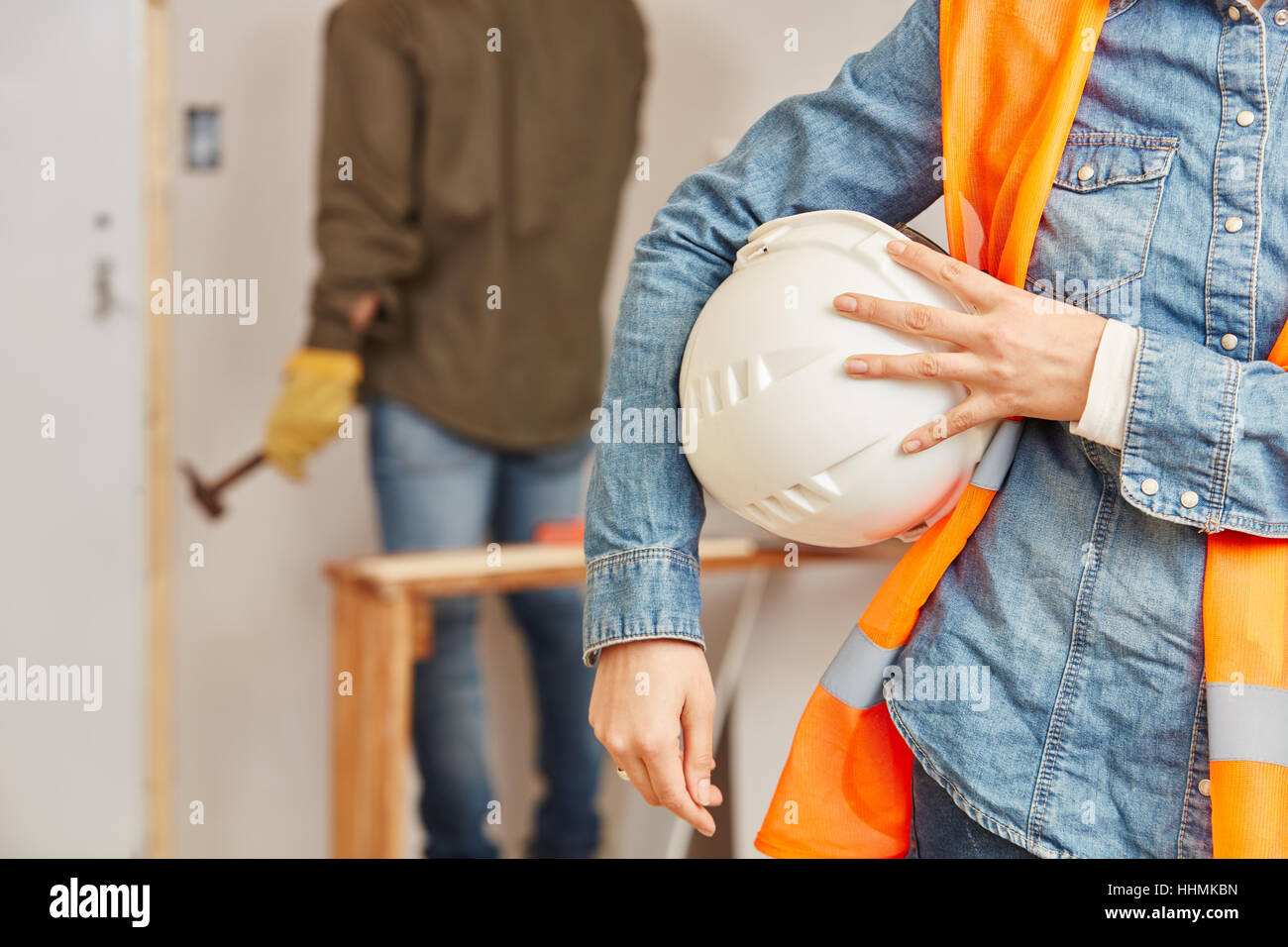Construction worker with helmet at construction site Stock Photo