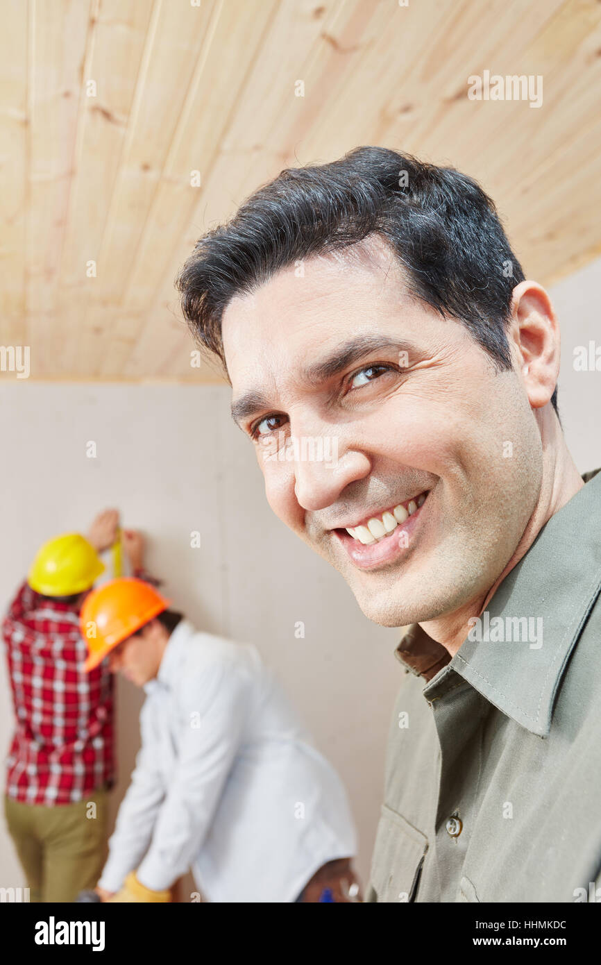 Man as successful craftsman and expert skilled worker Stock Photo