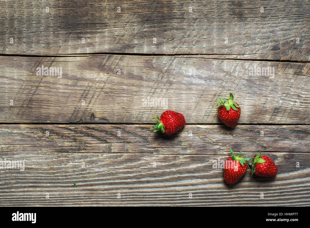 Strawberry on wooden background Stock Photo - Alamy