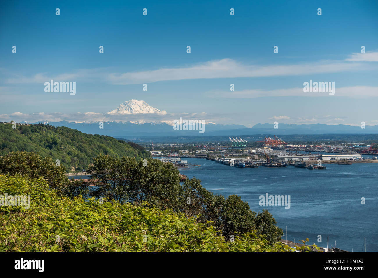Majestic Mount Rainier rises up over the Port of Tacoma in Washington ...