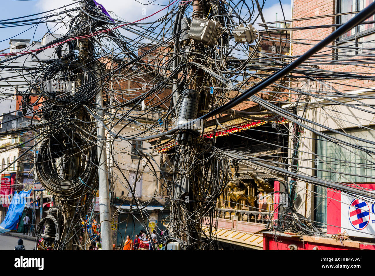 Chaotic electricity supply, hundreds of wires around poles, Kathmandu, Kathmandu District, Nepal Stock Photo