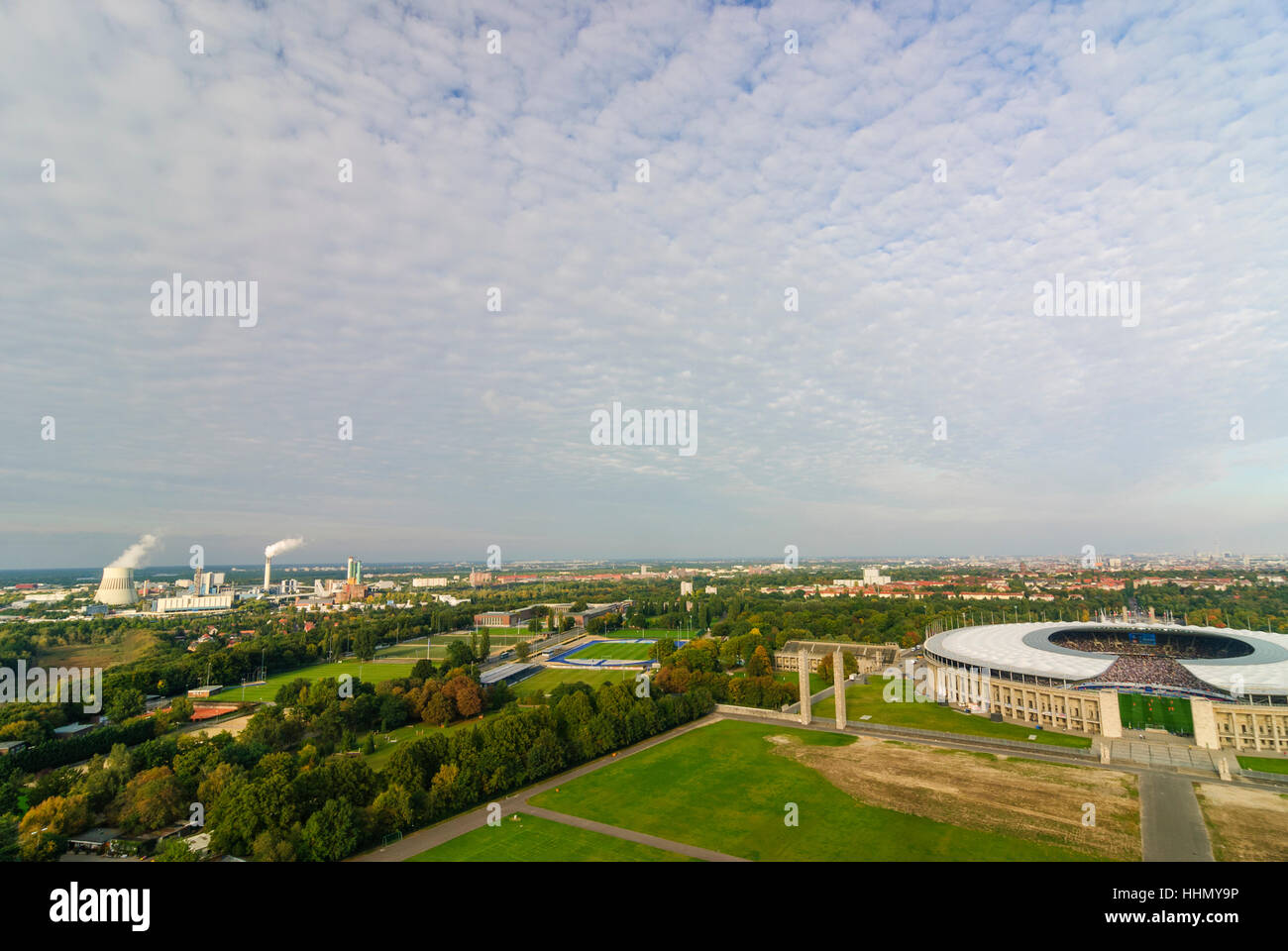 Berlin: Reuter heating plant of Vattenfall and Olympiastadion  (Olympic Stadium), , Berlin, Germany Stock Photo