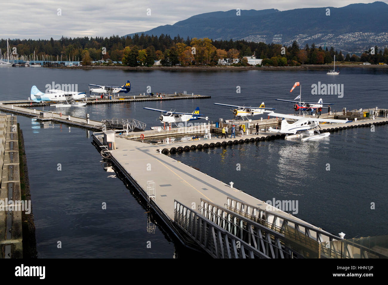 Harbour Air seaplanes moored at the Vancouver Harbour Flight Centre