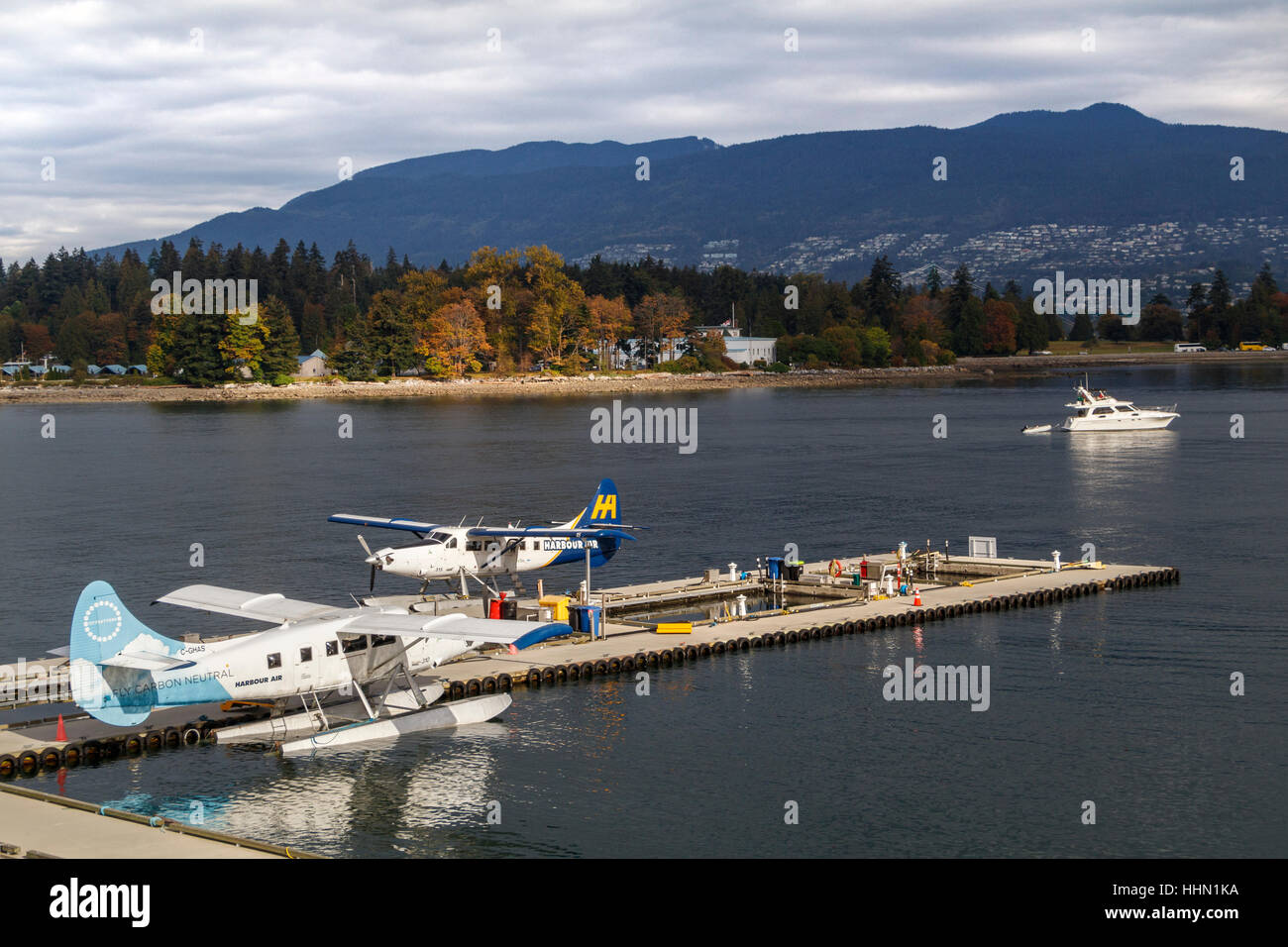 Harbour Air seaplanes moored at the Vancouver Harbour Flight Centre, British Columbia, Canada. Stock Photo