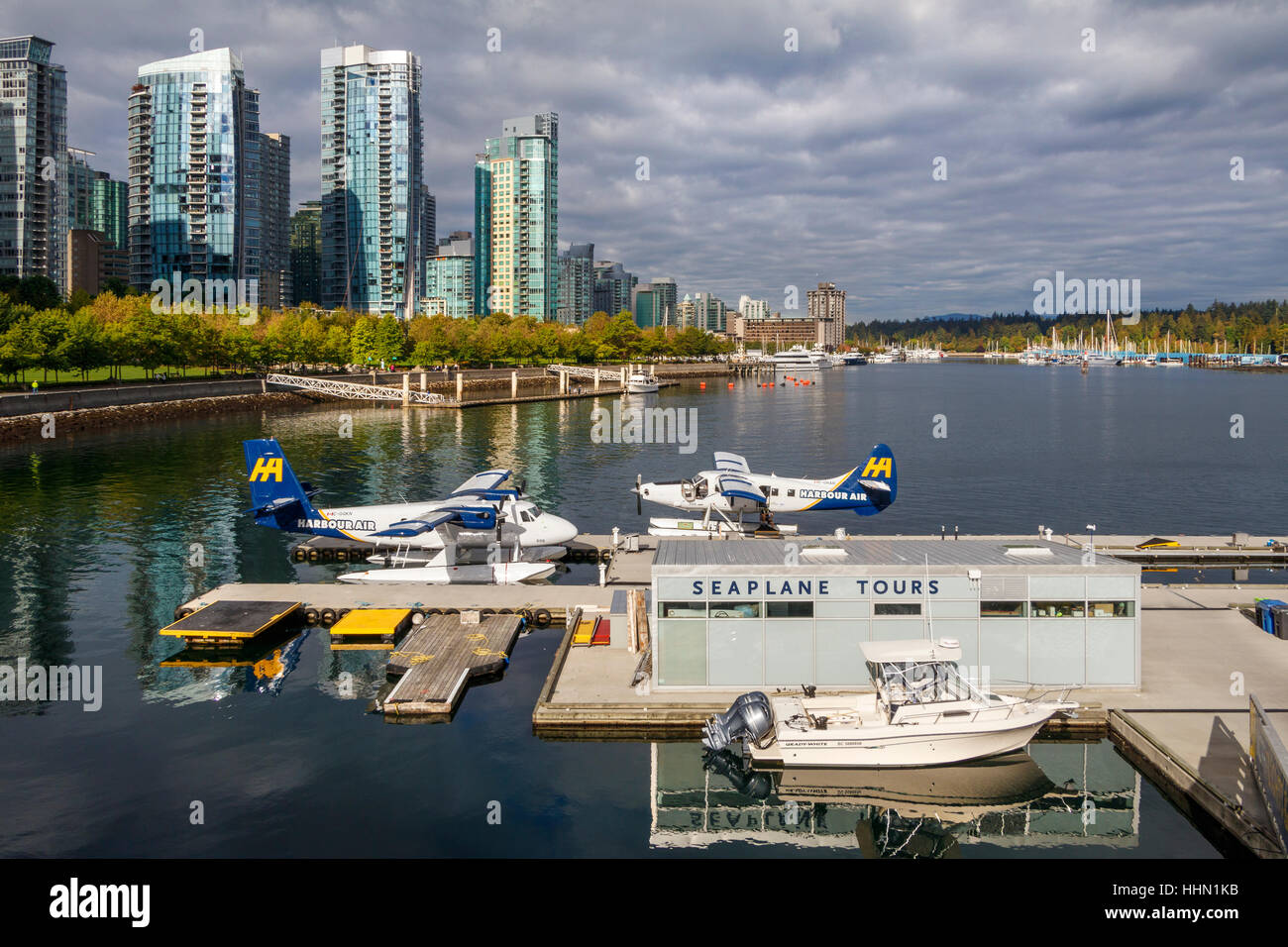 Harbour Air seaplanes moored at the Vancouver Harbour Flight Centre