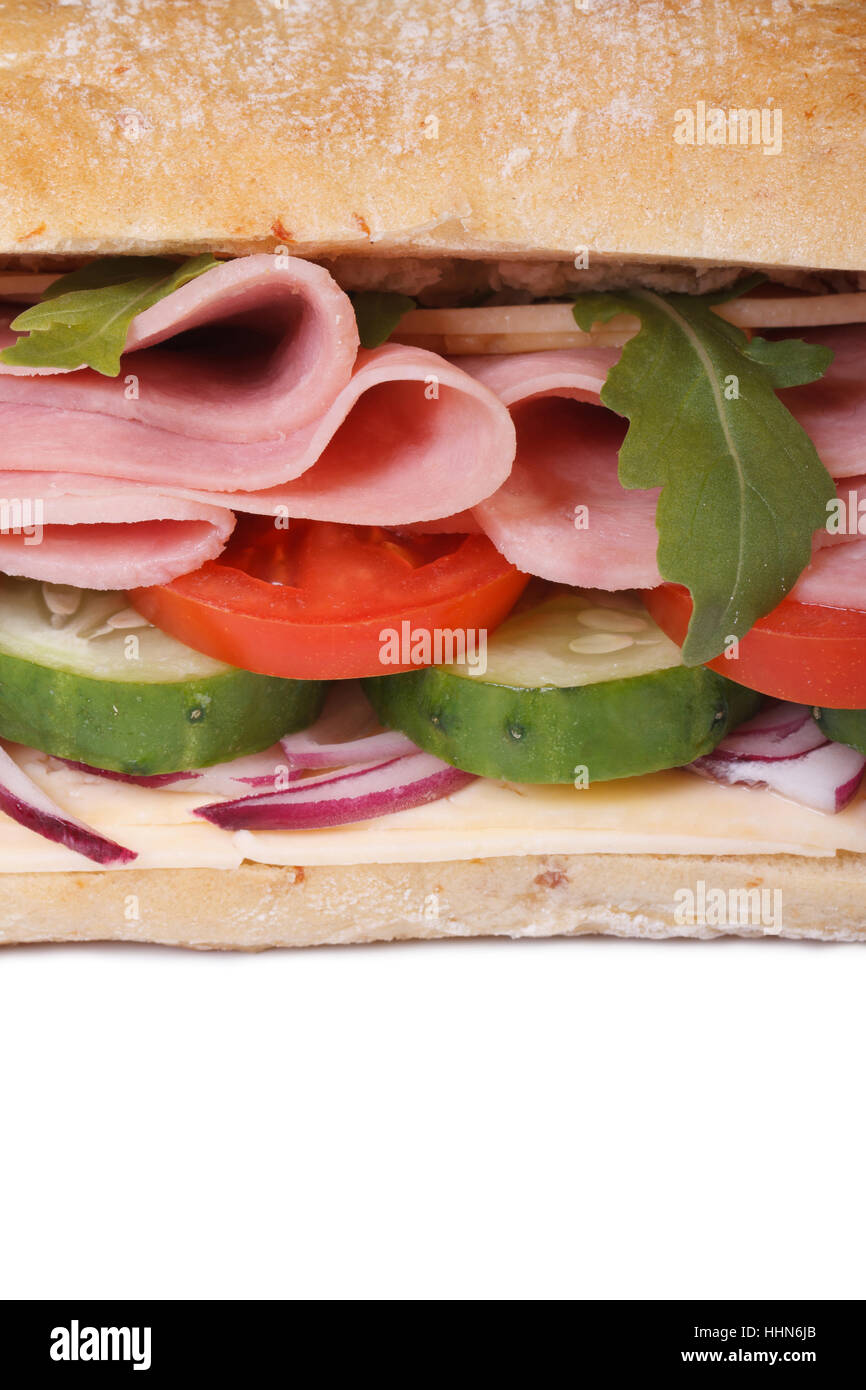 sandwich ciabatta with ham, fresh vegetables and arugula salad isolated on white background macro. vertical Stock Photo