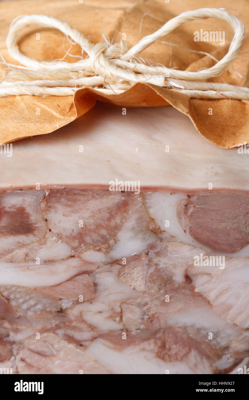 Headcheese wrapped in paper and tied with twine macro vertical Stock Photo Alamy