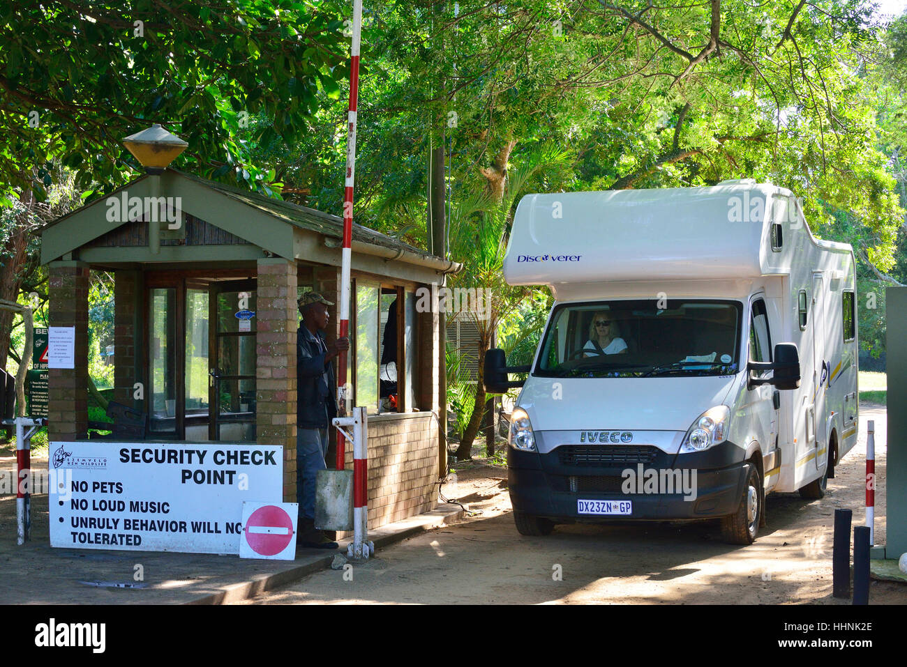 Motorhome checking out of the security gates to the entrance to Stock Photo - Alamy