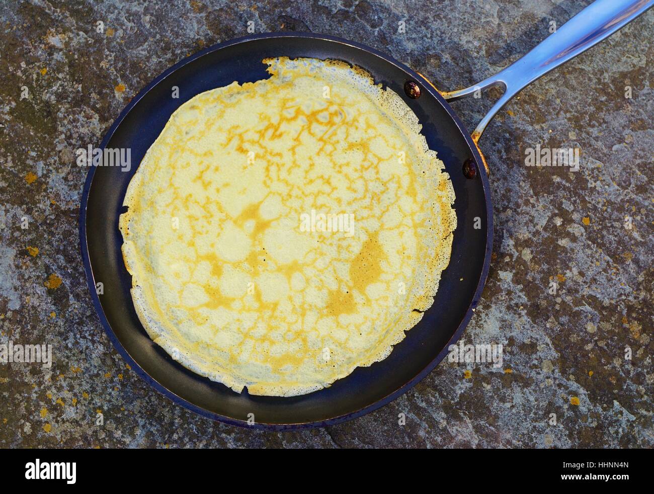 A French crepe just cooked in a flat pan Stock Photo Alamy