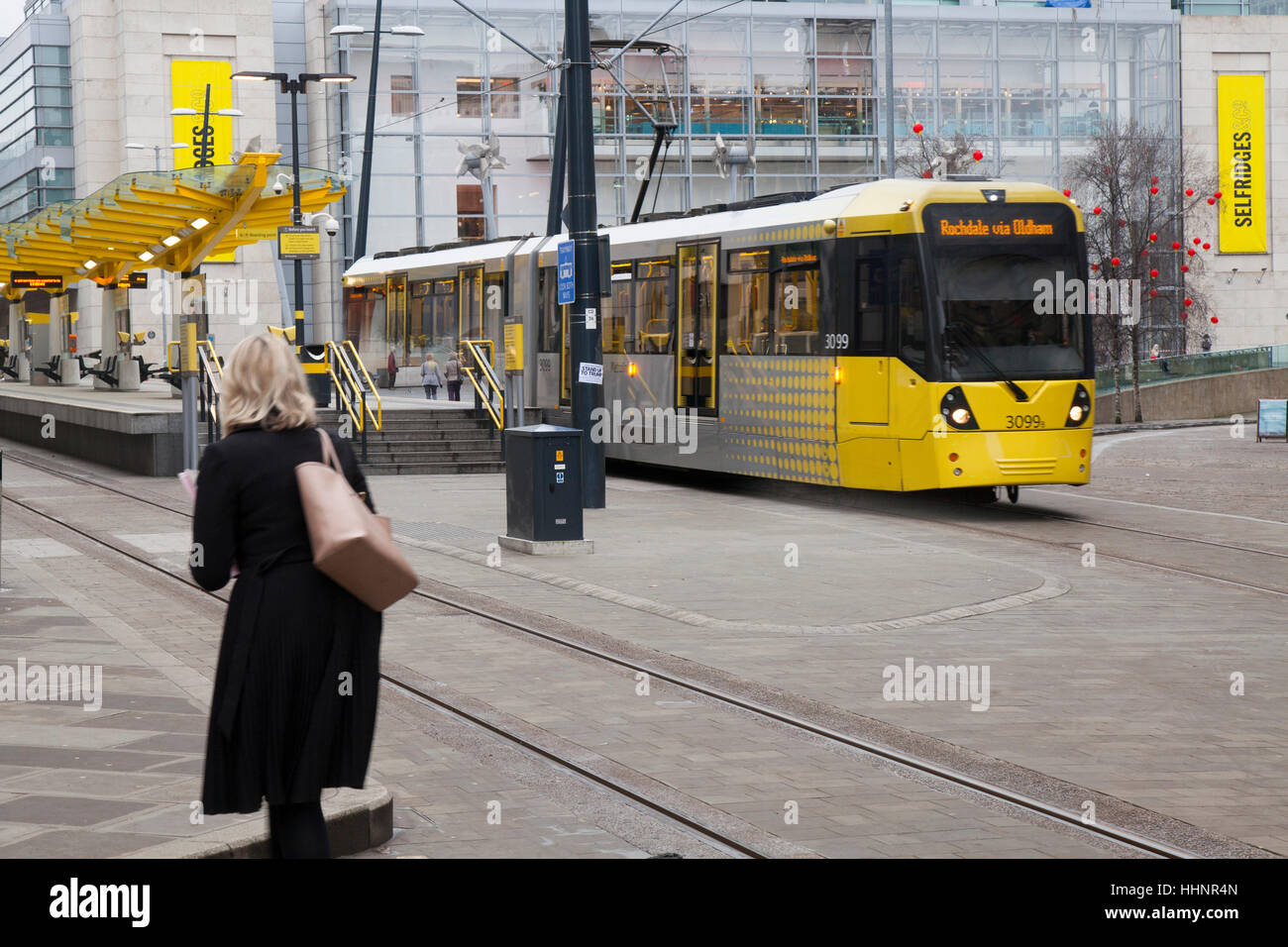 Piccadilly Gardens Tram, tramway, trolleybus, trolleybuses  in Exchange Square, Manchester, UK Stock Photo