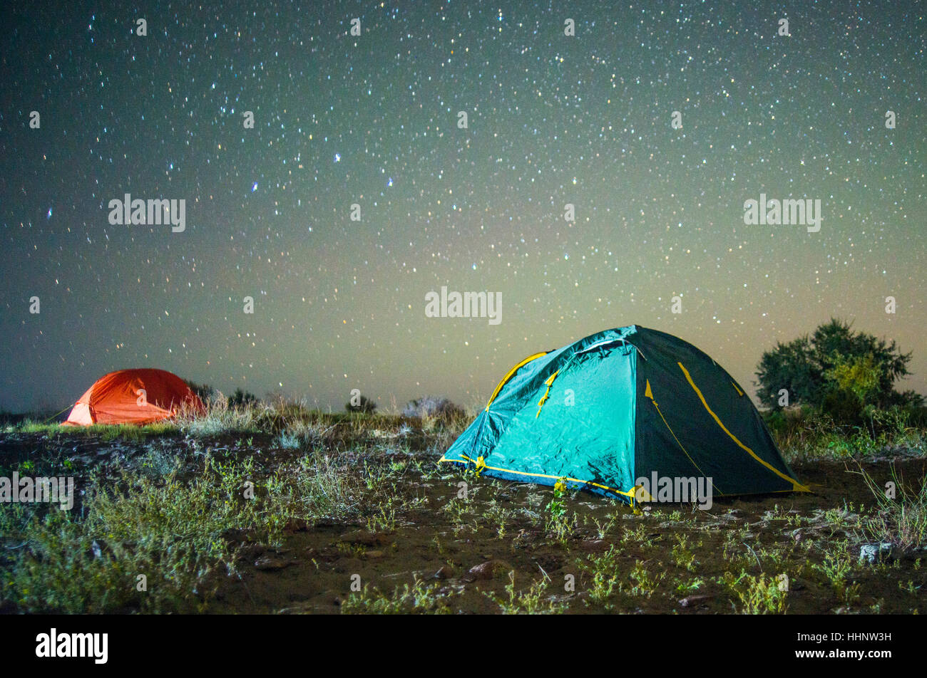 Camping tents under starry sky Stock Photo - Alamy