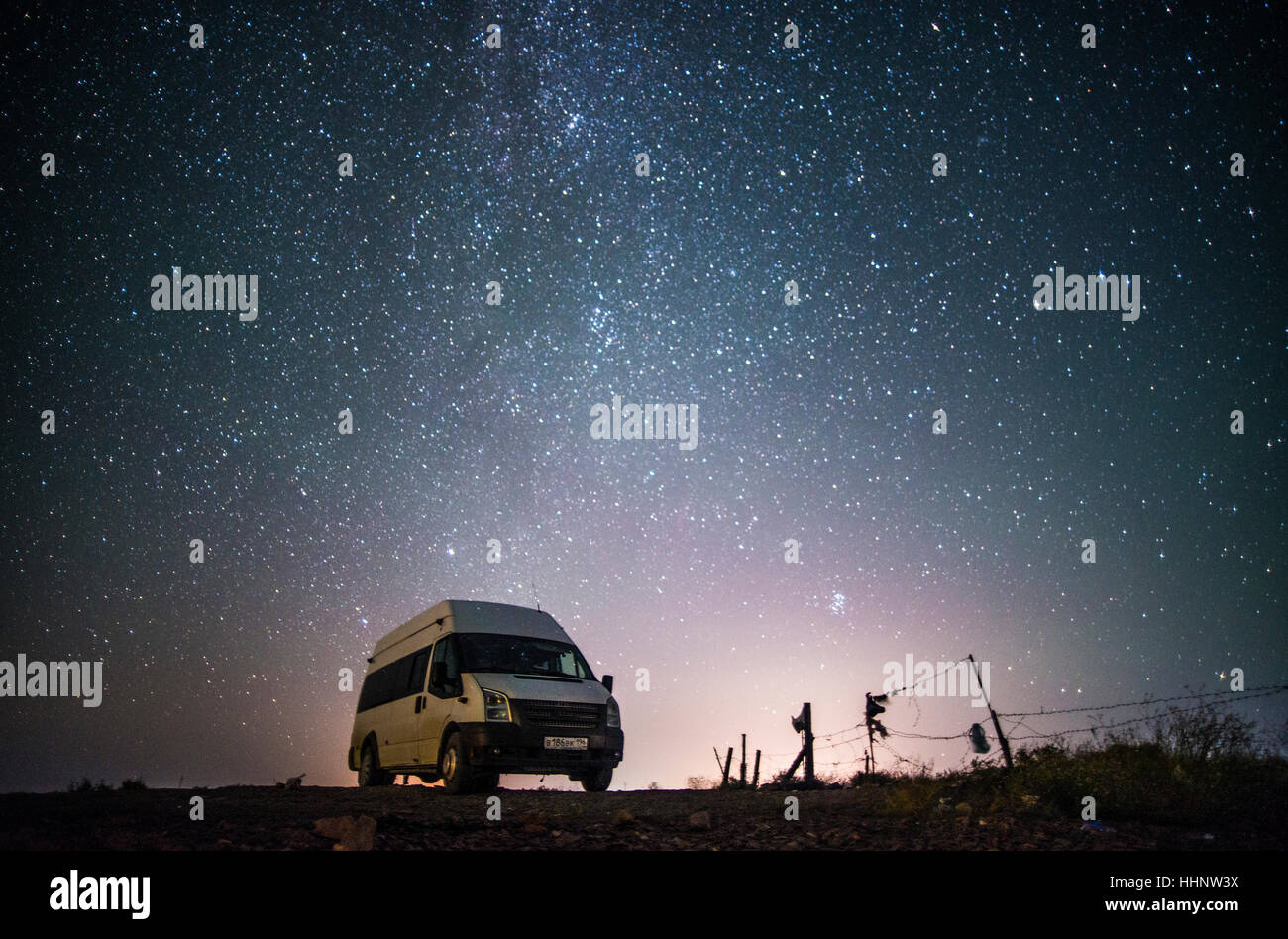 Camper van under starry sky Stock Photo - Alamy