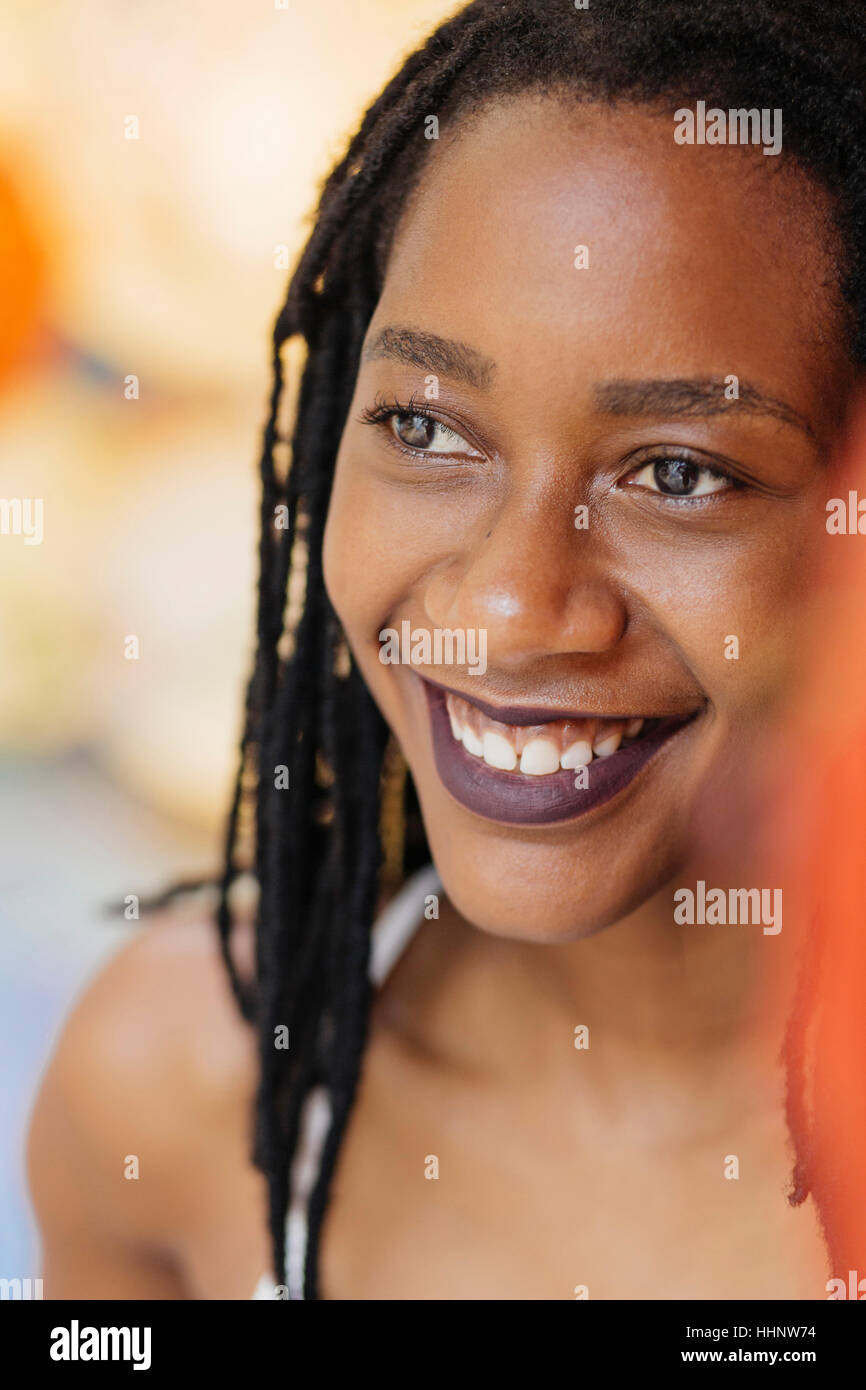 Portrait of smiling Mixed Race woman Stock Photo