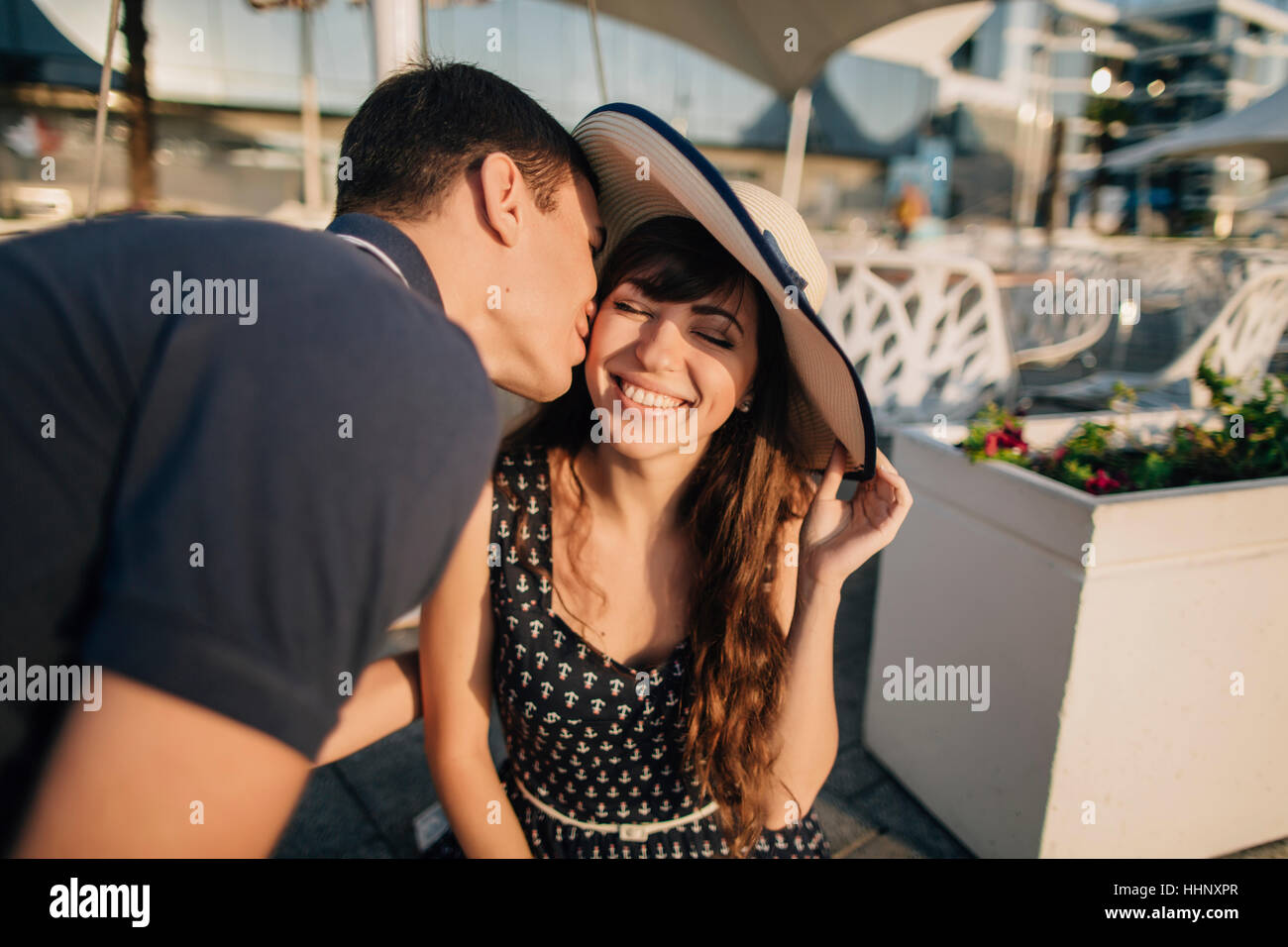 Woman man kissing outdoors hi-res stock photography and images - Alamy