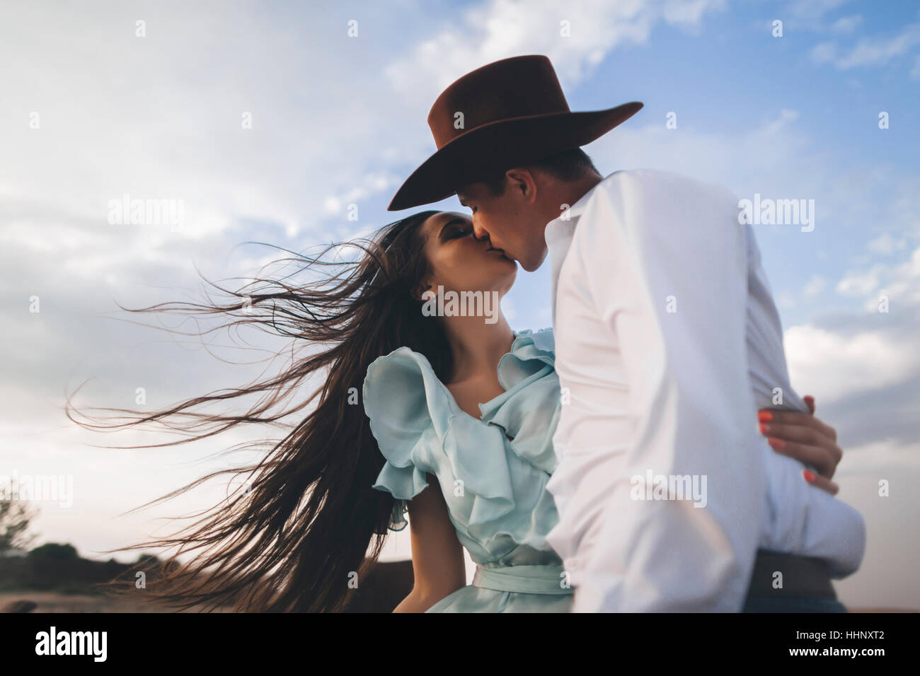 Cowboy hat kissing hi-res stock photography and images - Alamy