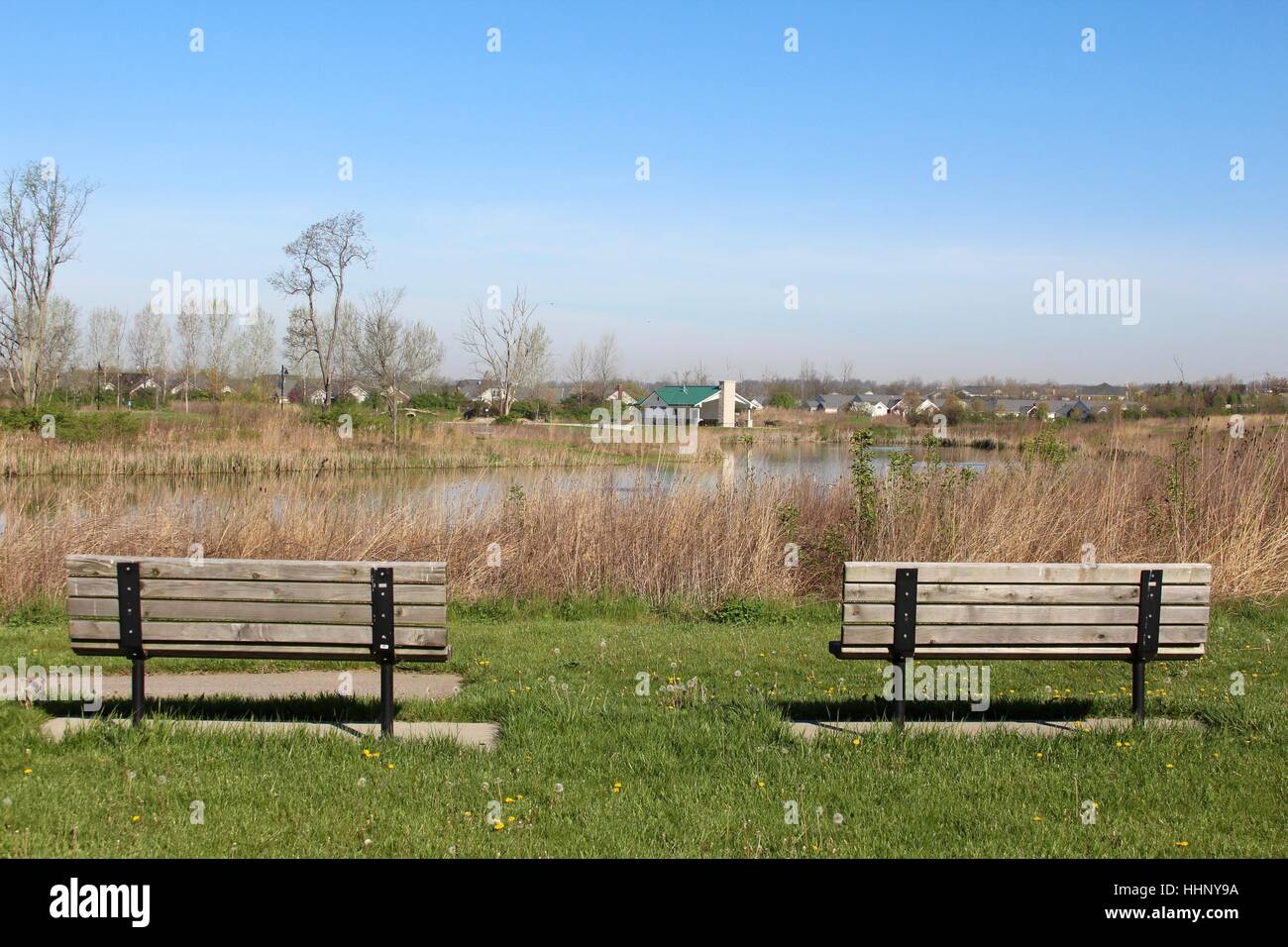 Two empty benches in the park Stock Photo - Alamy