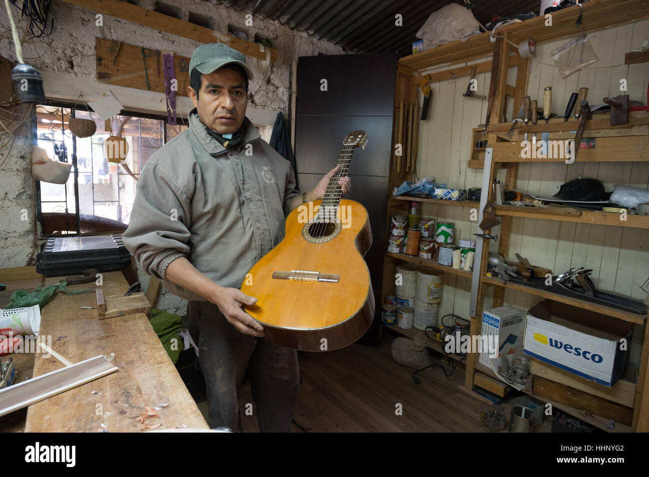 Guitar instrument maker in San Bartolome, Ecuador, South America Stock Photo