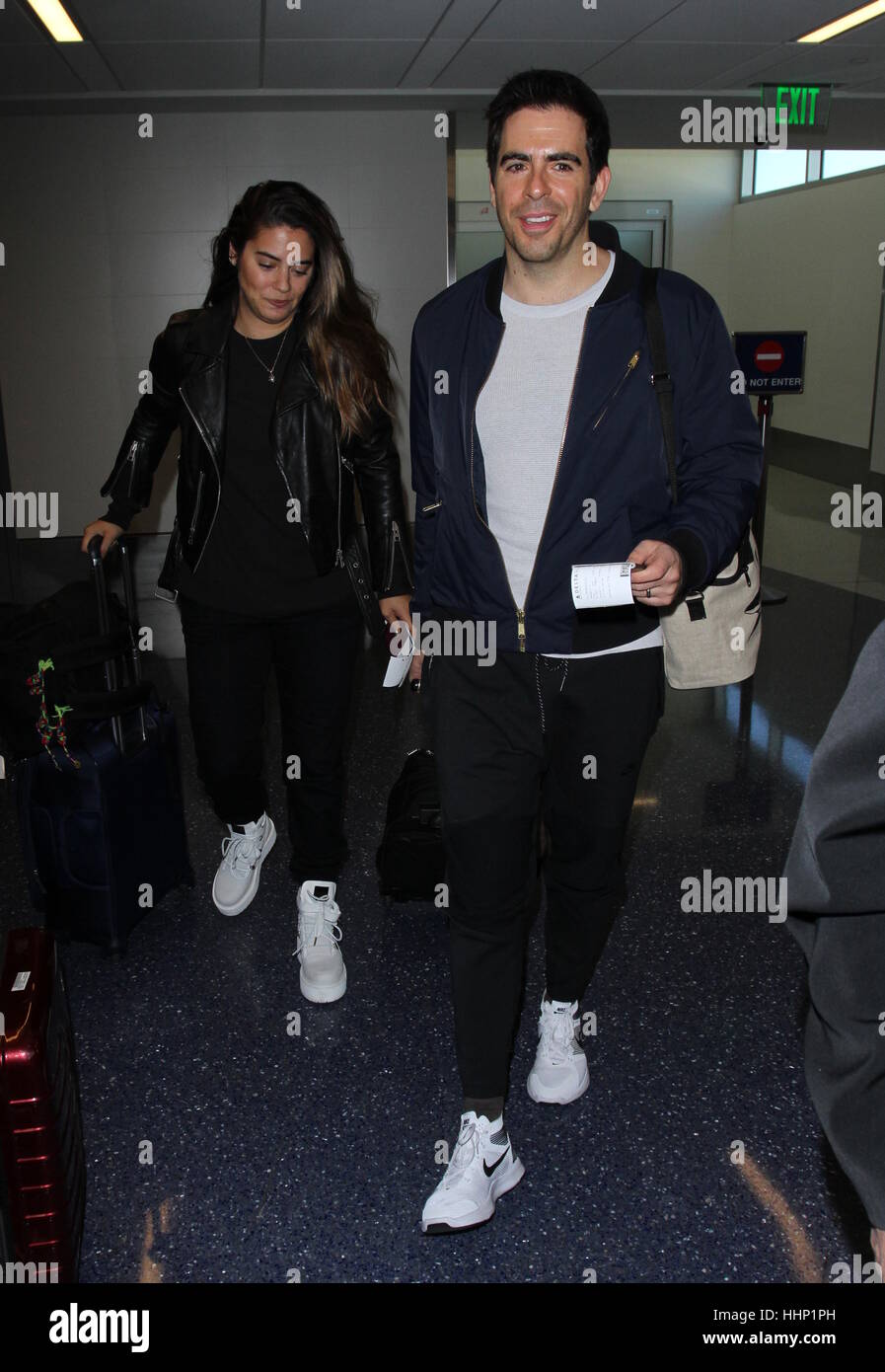 Eli Roth and his wife Lorenza Izzo arrive at Los Angeles International ...