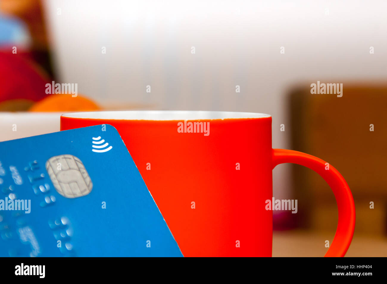 Using contactless payment card to buy a coffee Stock Photo