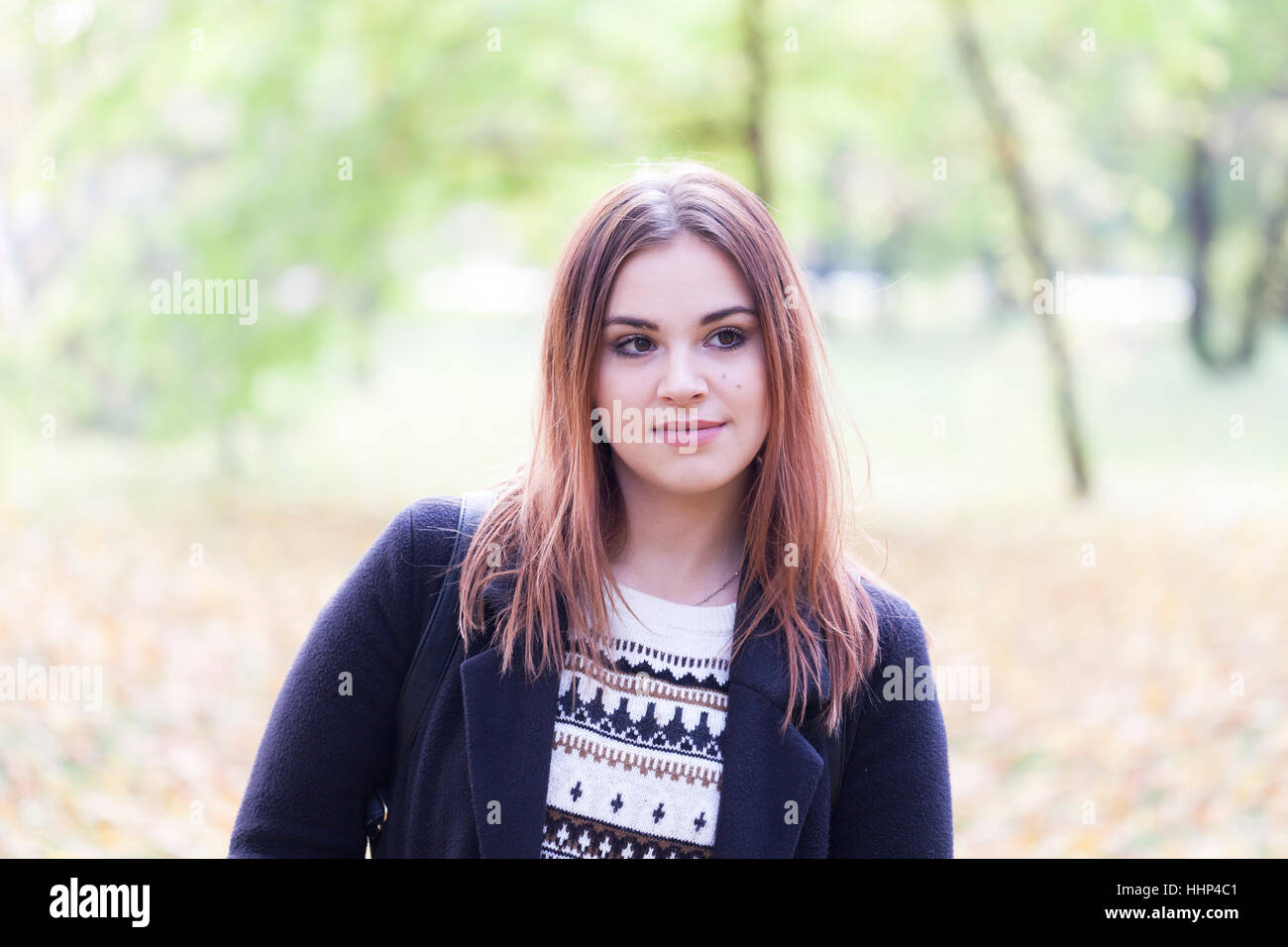 Beautiful young girl in nature, Selective focus and small depth of ...