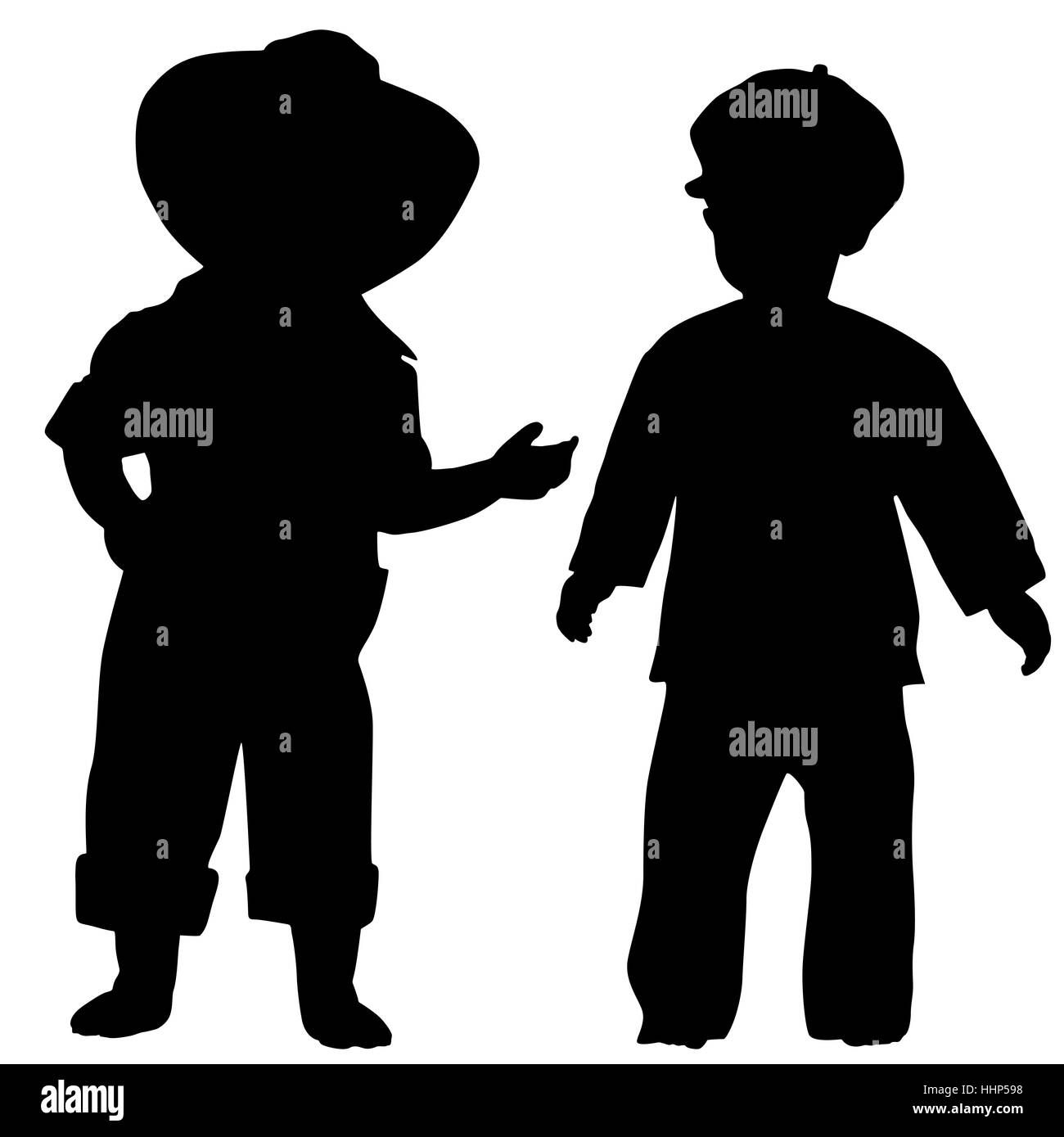 Silhouettes of two small boys Stock Photo