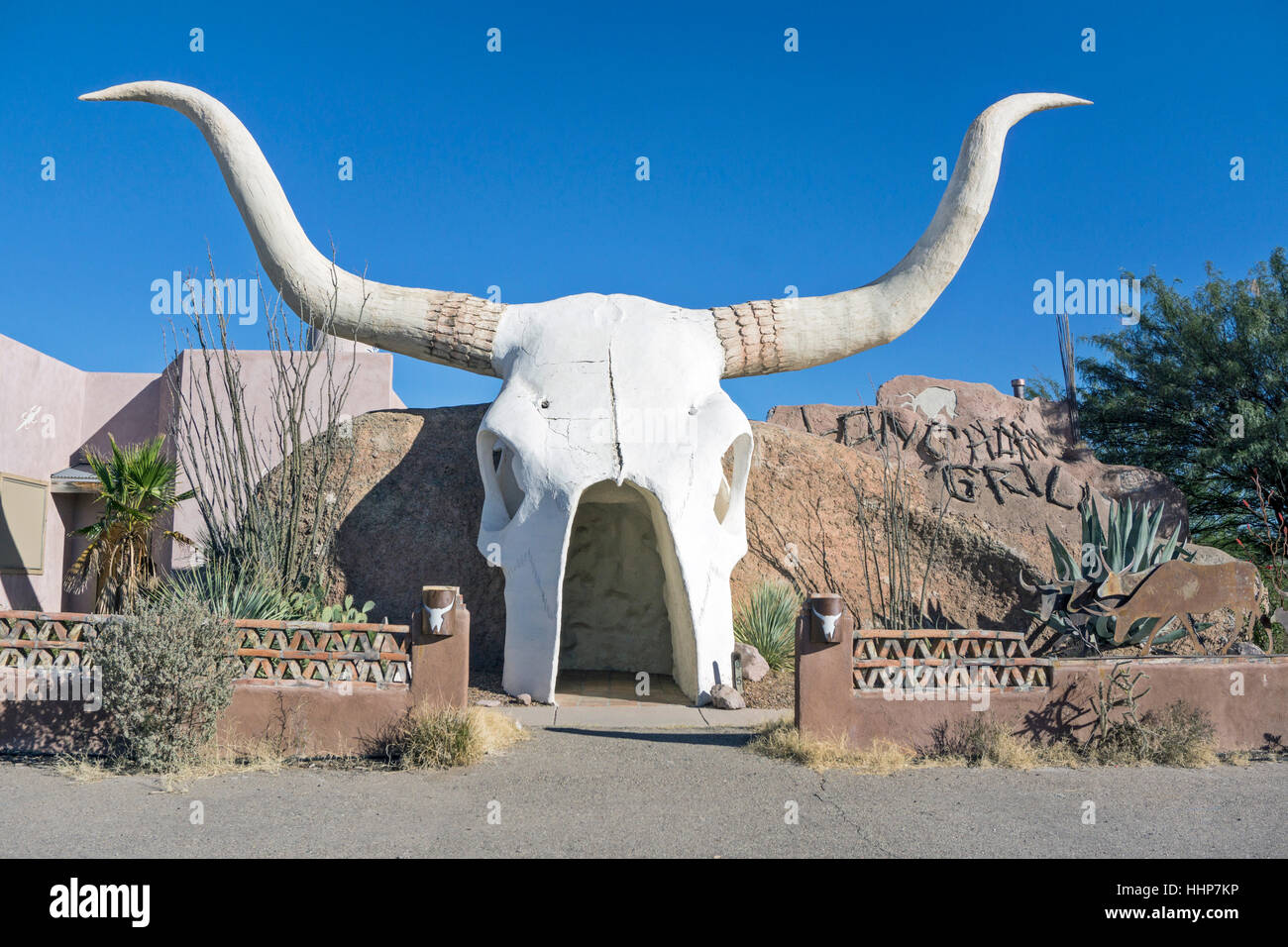 entrance to Longhorn Grill now used only for events is through spectacular faux Longhorn skull attached to apparent rock formation  Amado Arizona Stock Photo