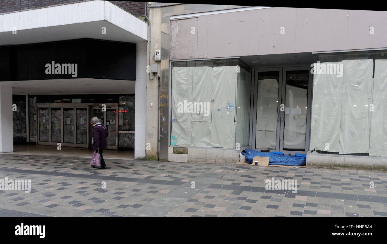 Homeless man with possessions in  Sauchiehall street, Glasgow Stock Photo