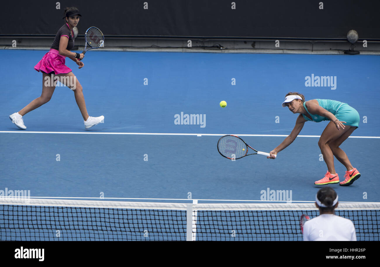 Melbourne, Australia. 20th Jan, 2017. India's Sania Mirza (L) and Barbora Strycova of the Czech Republic compete during the women's doubles second-round match against China's Zhang Shuai and Australia's Samantha Stosur at the Australian Open Tennis Championships in Melbourne, Australia, Jan. 20, 2017. Zhang and Stosur lost 0-2. Credit: Lui Siu Wai/Xinhua/Alamy Live News Stock Photo