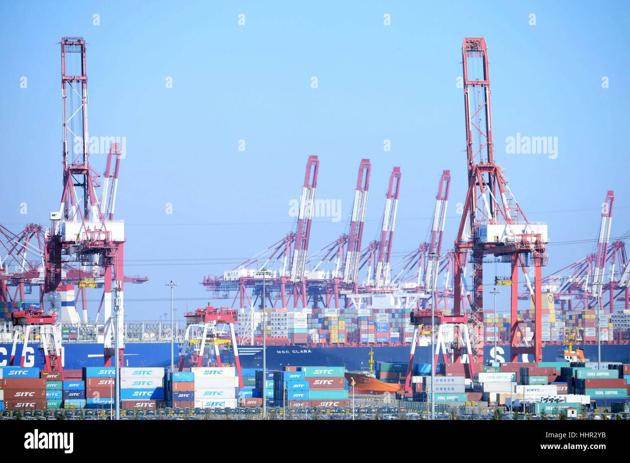 Qingdao, Qingdao, China. 20th Jan, 2017. Qingdao, CHINA-January 20 2017: (EDITORIAL USE ONLY. CHINA OUT) .The prosperous Harbor of Qingdao in Qingdao, east China's Shandong Province, January 20th, 2017. According to statistics released by China's National Bureau of Statistics, the Gross Domestic Product (GDP) reached 74.41 trillion in 2016, presenting an increase of 6.7 percent than that of last year. Credit: SIPA Asia/ZUMA Wire/Alamy Live News Stock Photo