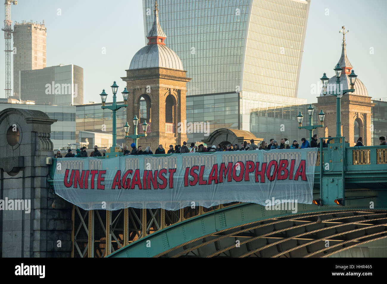 London, UK. 20 January, 2017. On the eve of Donald Trumps inauguration as the 45th President of the United States of America, and in defiance of his politics of hate and division, ’Bridges not walls’ dropped banners from many bridges around the World including Blackfriars Bridge in London. David Rowe/Alamy Live News Stock Photo