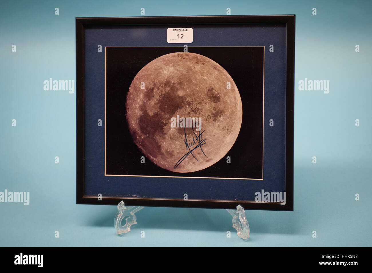 A collection of more than 1,000 signatures from iconic historical figures from the past five centuries will be offered by auctioneers Campbells on Tuesday, January 24th 2017, in Worthing. In Photo: One of the lots that will be offered for sale at the auction, a autograph by Neil Armstrong, first person to walk on the moon, Apollo 11, 1969, on a photograph of the moon. Credit: Scott Ramsey/Alamy Live News Stock Photo