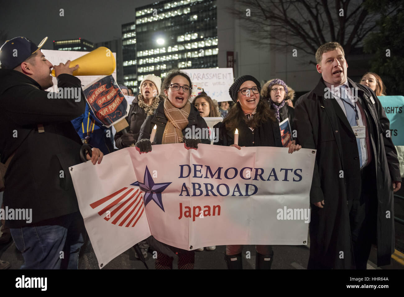 Tokyo, Japan. 20th Jan, 2017. US citizens living in Japan shout slogans during a march to thank outgoing President Barack Obama and reject US President-elect Donald Trump before his inauguration at a park in Tokyo, Japan. Around 200 people participated to the rally organised by Democrats Abroad Japan and held a few hours before US President-elect Trump's inauguration. Credit: Alessandro Di Ciommo/ZUMA Wire/Alamy Live News Stock Photo