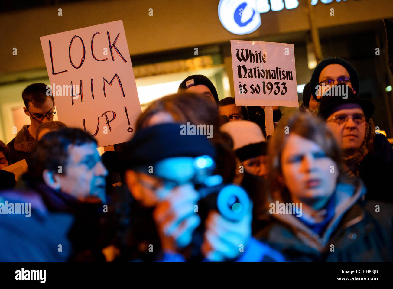 Berlin, Germany. 20th Jan, 2017. Participant holding up signs that read 'Lock him up' and 'White Nationalism is so 1933' at the demonstration 'Nein zum weltweiten Trumpismus' (lt. No to worldwide Trumpism) from the initiative 'The Coalition' in Berlin, Germany, 20 January 2017. Photo: Gregor Fischer/dpa/Alamy Live News Stock Photo